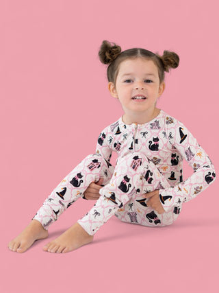 BROOMSTICKS AND BLOSSOMS DREAM ROMPER