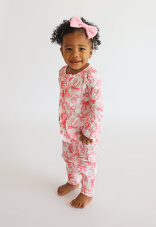 BOW CHECKERED CHARM DREAM RUFFLE ROMPER