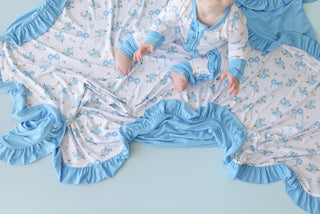 POWDER BLUE POSIE DREAM RUFFLE BLANKET