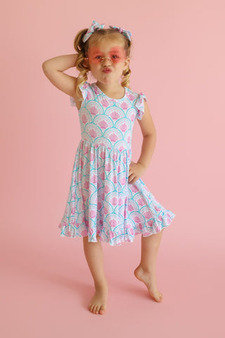 COQUETTE COAST CAP SLEEVE DREAM RUFFLE DRESS