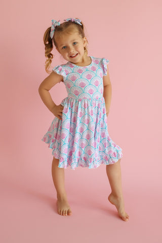 COQUETTE COAST CAP SLEEVE DREAM RUFFLE DRESS