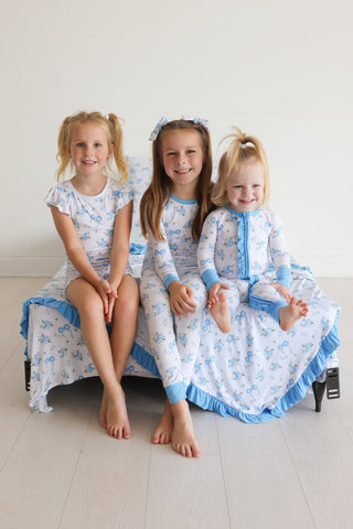POWDER BLUE POSIE DREAM RUFFLE ROMPER