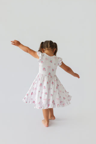 TIED WITH ROSES DREAM CAP SLEEVE RUFFLE DRESS