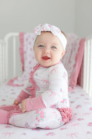 TIED WITH ROSES DREAM RUFFLE ROMPER