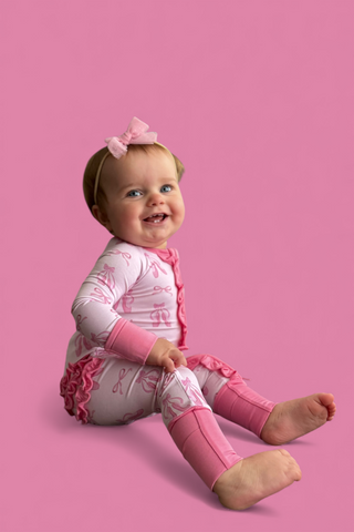 BALLET BOW BLISS DREAM RUFFLE ROMPER