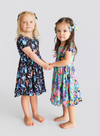 OCEAN GLOW CAP SLEEVE DREAM RUFFLE DRESS
