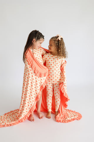 PEACH PERFECT BOWS DREAM RUFFLE BLANKET