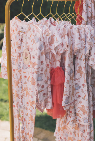 KINSLEY'S BLOOM & BOOTS DREAM RUFFLE ROMPER