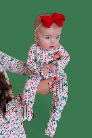 WRAPPED IN JOY DREAM RUFFLE ROMPER