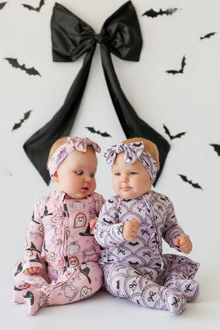 BOWTIFUL BATS DREAM RUFFLE ROMPER