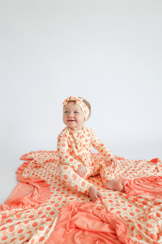 PEACH PERFECT BOWS DREAM RUFFLE BLANKET