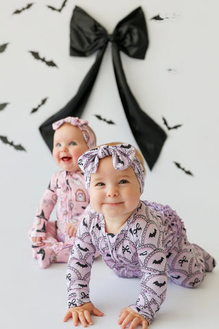 BOWTIFUL BATS DREAM RUFFLE ROMPER