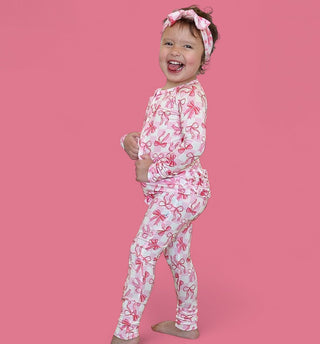 BOW CHECKERED CHARM DREAM RUFFLE ROMPER
