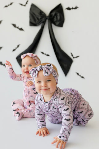 BOWTIFUL BATS DREAM RUFFLE ROMPER