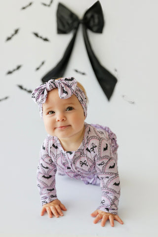 BOWTIFUL BATS DREAM RUFFLE ROMPER