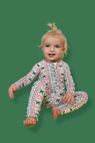 WRAPPED IN JOY DREAM RUFFLE ROMPER