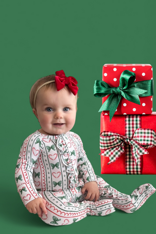 WRAPPED IN JOY DREAM RUFFLE ROMPER