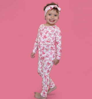 BOW CHECKERED CHARM DREAM RUFFLE ROMPER