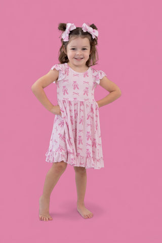 BALLET BOW BLISS DREAM CAP SLEEVE RUFFLE DRESS