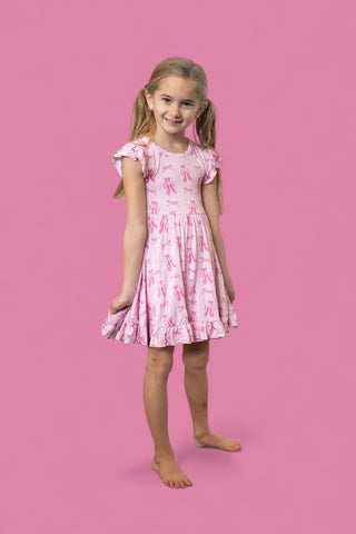 BALLET BOW BLISS DREAM CAP SLEEVE RUFFLE DRESS
