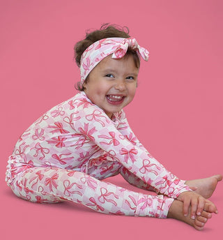 BOW CHECKERED CHARM DREAM RUFFLE ROMPER